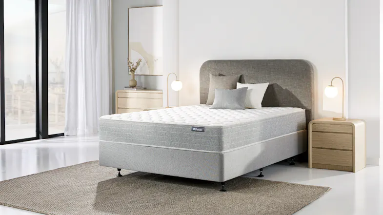 Lifestyle bedroom scene showing the Posture Life Firm Double Mattress on a bed base Lifestyle bedroom scene showing the Posture Life Firm Double Mattress on a bed base