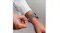 A hand wearing the watch A hand wearing the watch