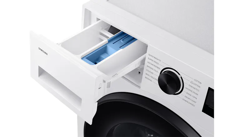 An open detergent drawer with compartments for liquid and soap An open detergent drawer with compartments for liquid and soap