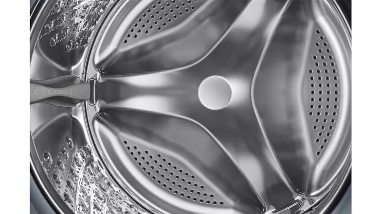 Close-up view of the steel drum with a visible grey agitator Close-up view of the steel drum with a visible grey agitator