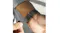 A view of a hand snapping on the watch via its magnetic clasp A view of a hand snapping on the watch via its magnetic clasp