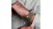 A hand wearing the watch A hand wearing the watch