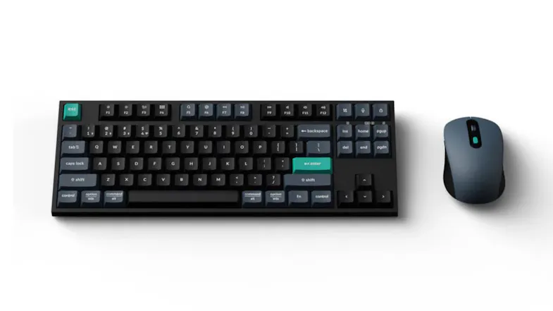 A front-angled view of the Keychron B33-K9 Wireless Full-Size Mechanical Keyboard in black/teal finish A front-angled view of the Keychron B33-K9 Wireless Full-Size Mechanical Keyboard in black/teal finish