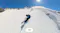 Snowboarder descending a steep mountain with an "ON" status icon Snowboarder descending a steep mountain with an "ON" status icon