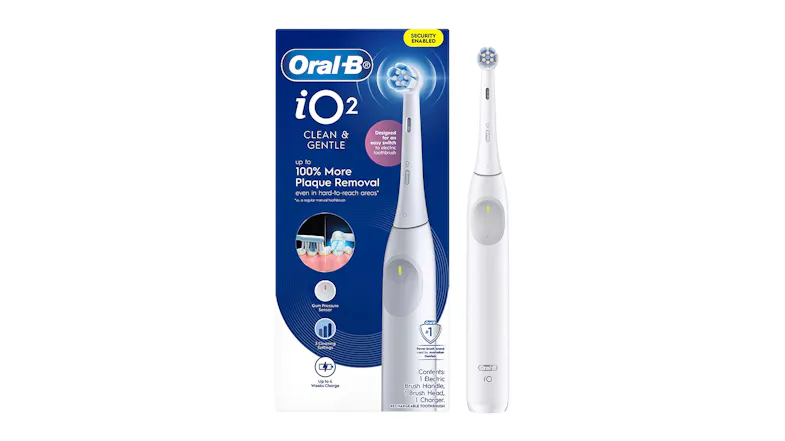 Product box showing the toothbrush, features, and 100% plaque removal Product box showing the toothbrush, features, and 100% plaque removal