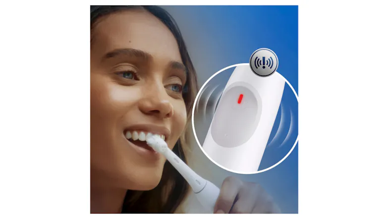 Close-up of a woman brushing her teeth Close-up of a woman brushing her teeth