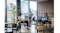 Group working in a modern office with the unit as a central hub Group working in a modern office with the unit as a central hub