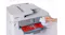 Hand tapping a white NFC card against the front control panel Hand tapping a white NFC card against the front control panel