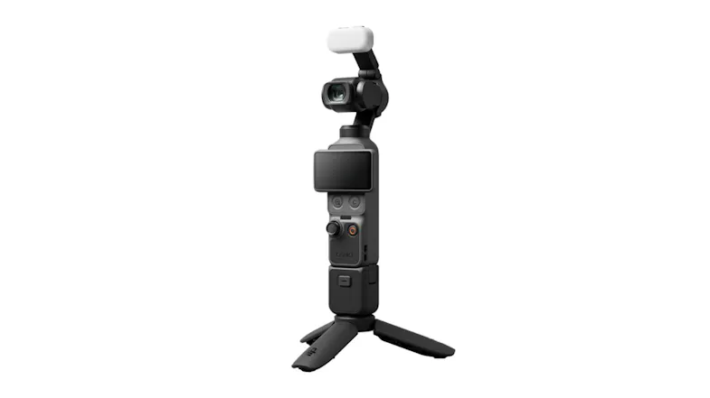 Frontal studio shot of the camera on a tripod with a white light accessory Frontal studio shot of the camera on a tripod with a white light accessory