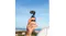 Hand holding the compact DJI device against a blurred sky background Hand holding the compact DJI device against a blurred sky background