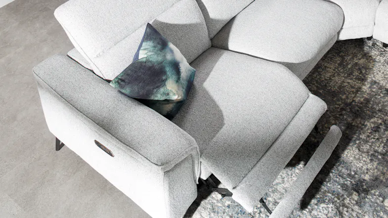 Padded sofa with an extended recliner Padded sofa with an extended recliner