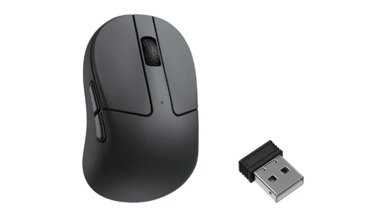 Black Keychron M4 wireless mouse with scroll wheel and side buttons, shown beside a small USB receiver Black Keychron M4 wireless mouse with scroll wheel and side buttons, shown beside a small USB receiver