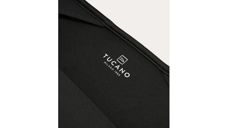 A sleeve interior fabric with a printed logo and "Milano 1985" text A sleeve interior fabric with a printed logo and "Milano 1985" text