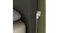 Close-up of a slim white charger fitted in a narrow wall gap Close-up of a slim white charger fitted in a narrow wall gap
