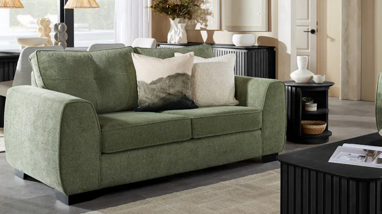 Botany 2 Seater Fabric Sofa upholstered in green fabric, shown front‑on in a styled living room Botany 2 Seater Fabric Sofa upholstered in green fabric, shown front‑on in a styled living room