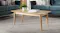 Rectangular Helsinki 1150mm coffee table in light oak, styled in a modern living room Rectangular Helsinki 1150mm coffee table in light oak, styled in a modern living room