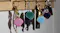 A row of keys on a wall rack featuring various coloured Life360 Tile trackers A row of keys on a wall rack featuring various coloured Life360 Tile trackers