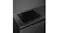 Angled view of the induction cooktop installed in a dark countertop with no cookware present Angled view of the induction cooktop installed in a dark countertop with no cookware present
