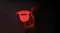 Close-up of the inside of the LED face mask glowing fully red in a dark setting Close-up of the inside of the LED face mask glowing fully red in a dark setting