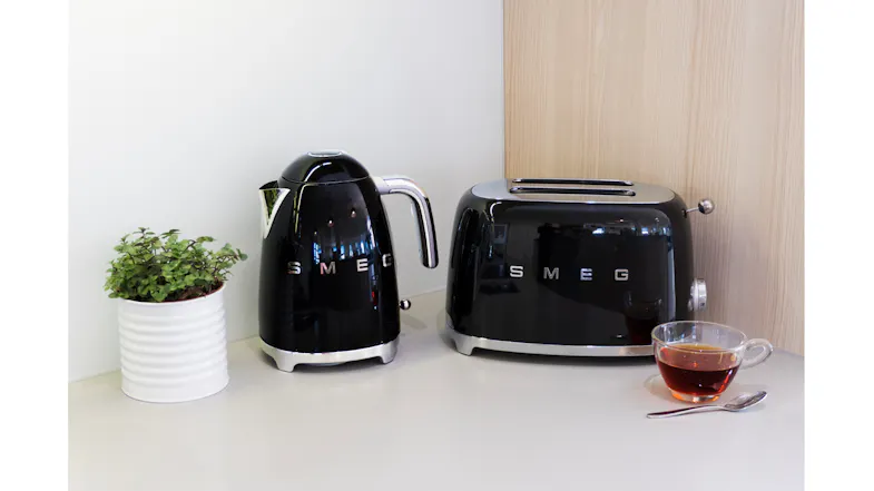 Smeg 50's Style 2 Slice Toaster paired with a glossy black kettle Smeg 50's Style 2 Slice Toaster paired with a glossy black kettle
