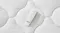 Top‑down close‑up of a white Tempur remote control resting on the mattress surface Top‑down close‑up of a white Tempur remote control resting on the mattress surface