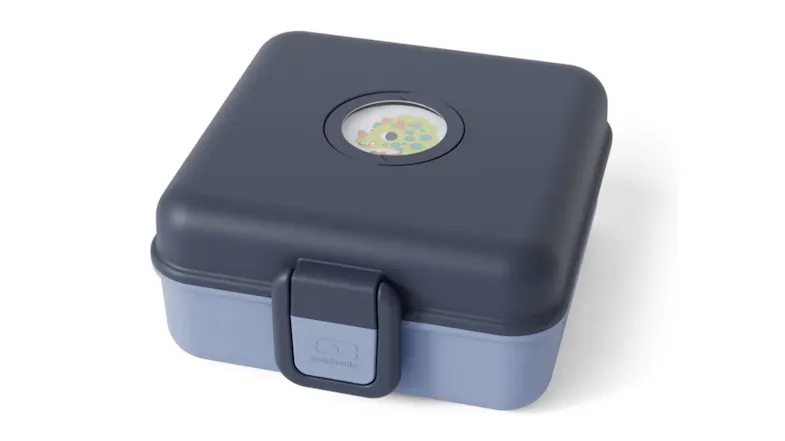 Monbento Snacky children’s bento snack box in blue with a hinged lid, front clasp, and playful animal window detail Monbento Snacky children’s bento snack box in blue with a hinged lid, front clasp, and playful animal window detail