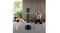 The punching bag is set up in a modern indoor space. Two people are shown practising punches and kicks on the bag The punching bag is set up in a modern indoor space. Two people are shown practising punches and kicks on the bag