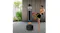 Indoor scene showing a person delivering a kick to the Centra punching bag placed on a flat floor against a wall Indoor scene showing a person delivering a kick to the Centra punching bag placed on a flat floor against a wall