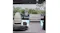 A matching collection of white Smeg Porsche Edition appliances styled in a bright kitchen A matching collection of white Smeg Porsche Edition appliances styled in a bright kitchen