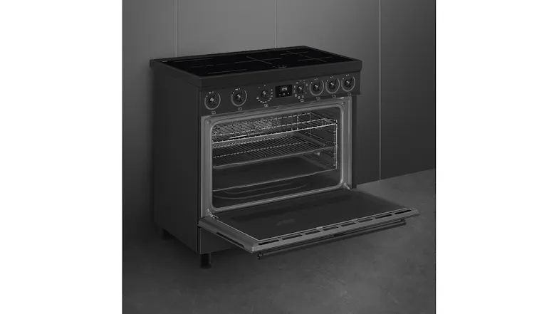Angled side view with the oven door fully lowered to the floor Angled side view with the oven door fully lowered to the floor