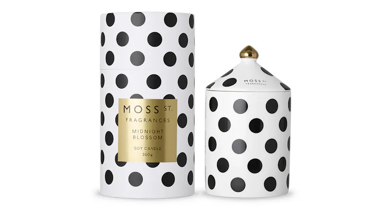 Moss St. Fragrances Midnight Blossom 360g ceramic soy candle shown beside its matching cylindrical box Moss St. Fragrances Midnight Blossom 360g ceramic soy candle shown beside its matching cylindrical box