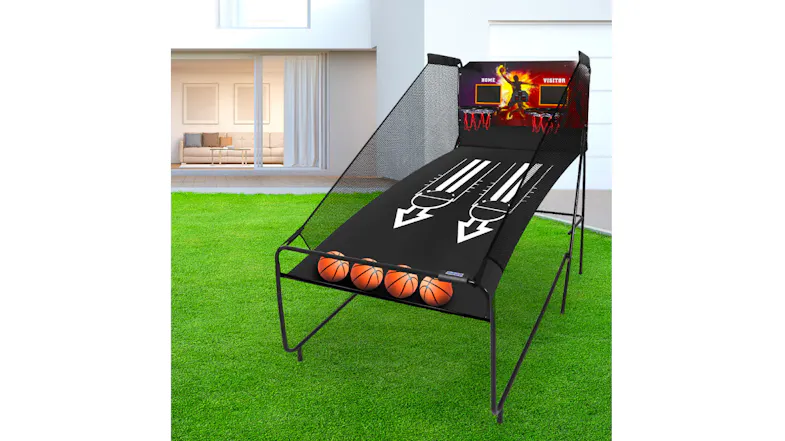 Basketball Centra Folding arcade game set up on a lawn outside a modern house, with balls in the return tray Basketball Centra Folding arcade game set up on a lawn outside a modern house, with balls in the return tray