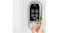 Hand pressing the fingerprint sensor on a Lockly smart door lock installed on a white door Hand pressing the fingerprint sensor on a Lockly smart door lock installed on a white door