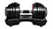 Front view of a Centra adjustable dumbbell on its stand, showing stacked plates and a central grip handle Front view of a Centra adjustable dumbbell on its stand, showing stacked plates and a central grip handle