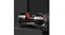 Adjustable dumbbell set displayed on a stand against a dark studio background Adjustable dumbbell set displayed on a stand against a dark studio background