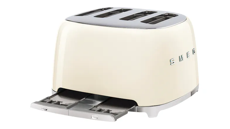 A rear view of the toaster with its removable crumb trays oulled out A rear view of the toaster with its removable crumb trays oulled out