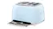 A rear view of the toaster with its removable crumb trays oulled out A rear view of the toaster with its removable crumb trays oulled out