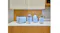 A view of the toaster and more pastel blue coloured Smeg appliance displayed on a wooden kitchen setup A view of the toaster and more pastel blue coloured Smeg appliance displayed on a wooden kitchen setup