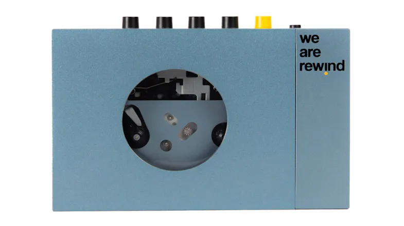 We Are Rewind "Kurt" Portable Cassette Player in blue with visible tape mechanism window We Are Rewind "Kurt" Portable Cassette Player in blue with visible tape mechanism window