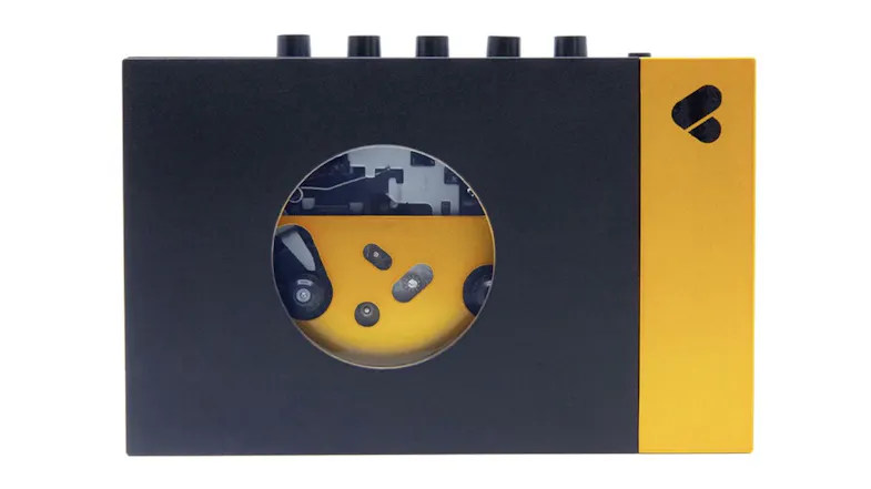 We Are Rewind "Amy" Portable Cassette Player in black and yellow with visible tape mechanism window We Are Rewind "Amy" Portable Cassette Player in black and yellow with visible tape mechanism window