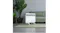 Lifestyle view of the heater in a modern room with green plants Lifestyle view of the heater in a modern room with green plants