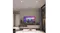 Living room with four recessed lights emitting a cool white glow Living room with four recessed lights emitting a cool white glow