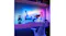 Wide shot of a blue-lit workspace with a 15W dock and ergonomic chair Wide shot of a blue-lit workspace with a 15W dock and ergonomic chair
