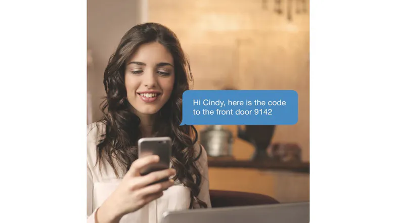 Person using a smartphone app to share a smart door lock access code for the front door Person using a smartphone app to share a smart door lock access code for the front door