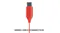 Detailed vertical shot of the slim red USB-C plug Detailed vertical shot of the slim red USB-C plug