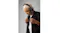 A man looking down while wearing the over-ear headphones A man looking down while wearing the over-ear headphones