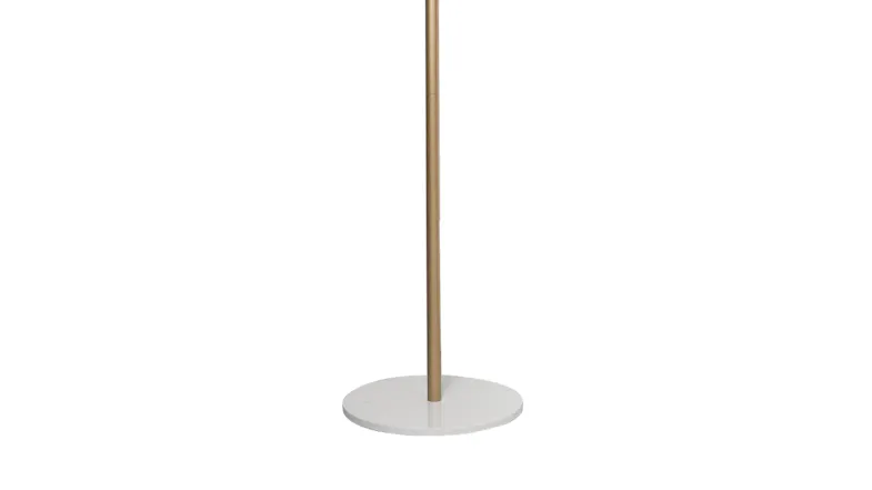 Close‑up of the lower pole and round white base of a gold freestanding coat rack Close‑up of the lower pole and round white base of a gold freestanding coat rack