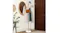 Gold Levede Minimal coat rack in an entryway, holding a hat, bag, and jacket beside a wall mirror and wooden door Gold Levede Minimal coat rack in an entryway, holding a hat, bag, and jacket beside a wall mirror and wooden door