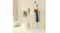 White Levede coat rack styled with a hat, bag, and clothing in a minimalist interior with plants White Levede coat rack styled with a hat, bag, and clothing in a minimalist interior with plants