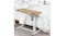 Adjustable side table positioned beside a bed, demonstrating use as an over‑bed or bedside table Adjustable side table positioned beside a bed, demonstrating use as an over‑bed or bedside table